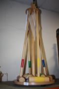 A MODERN WOODEN CROQUET SET