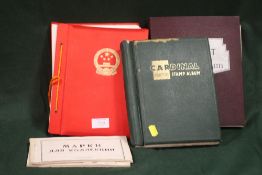 A COLLECTION OF VINTAGE STAMP ALBUMS TO INCLUDE AN ALBUM OF CHINESE STAMPS, RUSSIAN STAMPS, ETC.