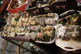 A LARGE QUANTITY OF COTTAGE FIGURES TO INCLUDE DAVID WINTER COTTAGES, LILLIPUT LANE ETC.