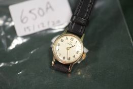 A LADIES 9CT GOLD CASED OMEGA WRISTWATCH