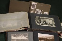 A COLLECTION OF VINTAGE BLACK AND WHITE PHOTOGRAPHS BOTH LOOSE AND IN ALBUMS