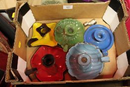 FIVE ENAMELLED CHAMBER STICKS