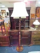 AN OAK BARLEYTWIST STANDARD LAMP