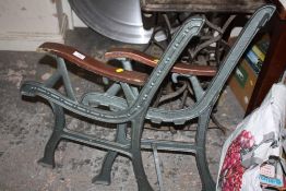 A PAIR OF PAINTED BENCH ENDS