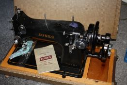 A CASED VINTAGE JONES SEWING MACHINE