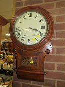 AN ANTIQUE MAHOGANY WALLCLOCK - PENDULUM