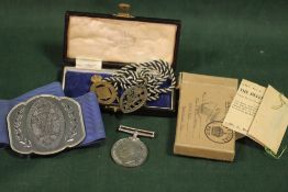 A QUEENS INSTITUTE OF DISTRICT NURSING BELT AND PENDANT/BROOCH, TOGETHER WITH A WWII DEFENCE MEDAL