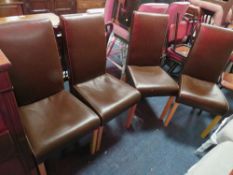 A SET OF 4 MODERN BROWN DINING CHAIRS
