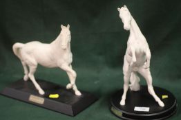 TWO MATTE FINISH WHITE HORSE FIGURES COMPRISING OF ROYAL DOULTON SPIRIT OF THE WILD AND A BESWICK