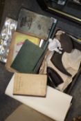 A SMALL TRAY OF CAR MECHANIC BOOKS TOGETHER WITH A VINTAGE IRON AND A BOOT LAST AN APPLE PRESS,