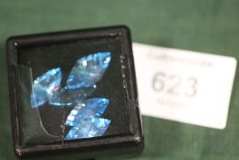 A COLLECTION OF SWISS BLUE TOPAZ STYLE STONES