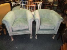 A PAIR OF MODERN UPHOLSTERED TUB ARMCHAIRS