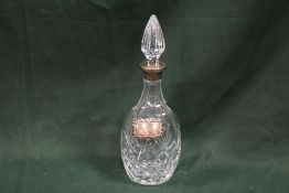 A HALLMARKED SILVER COLLARED DECANTER WITH A HALLMARKED SILVER 'SHERRY' LABEL