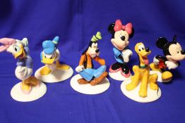 A SET OF SIX BOXED ROYAL DOULTON GOLD STAMPED MICKEY MOUSE COLLECTION FIGURES