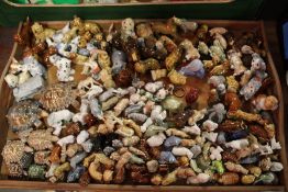 A TWIN HANDLED TRAY OF WADE FIGURES AND WHIMSIES