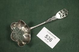 A HALLMARKED SILVER SIFTER SPOON