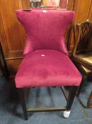 A MODERN PURPLE UPHOLSTERED BAR STOOL