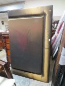 A LARGE MODERN HEADBOARD