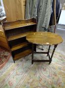AN OAK BARLEYTWIST TABLE AND A SMALL BOOKSHELF (2)