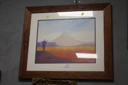 A MODERN FRAMED AND GLAZED TONY HUDSON PRINT OF A DESERT SCENE