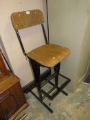 A MODERN INDUSTRIAL TYPE WOOD/METAL STOOL
