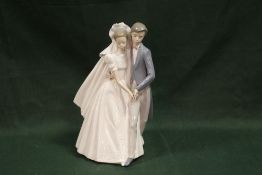 A NAO BRIDE AND GROOM FIGURE GROUP