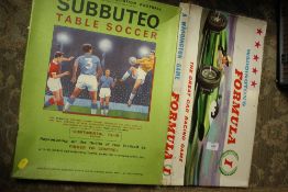 A BOXED VINTAGE WADDINGTONS FORMULA 1 RACING CAR GAME, TOGETHER WITH A BOXED SUBBUTEO GAME (2)