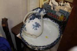 A VINTAGE BLUE AND WHITE FLORAL JUG AND BOWL SET