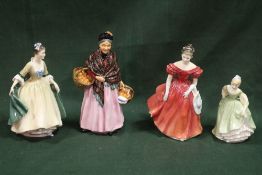 FOUR ROYAL DOULTON LADY FIGURES TO INCLUDE THE ORANGE LADY HN 1759, WINSOME HN 2220 ETC.