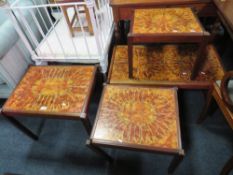 A RETRO TILE TOPPED COFFEE TABLE AND MATCHING NEST OF TABLES A/F