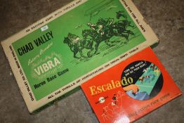 A VINTAGE BOXED CHAD VALLEY VIBRA HORSE RACE GAME, TOGETHER WITH A BOXED ESCALADO HORSE RACING