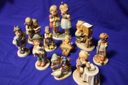 A COLLECTION OF GOEBEL AND HUMMEL FIGURES OF ASSORTED SIZES (10)
