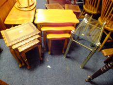 THREE ASSORTED NESTS OF TABLES AND TWO STOOLS