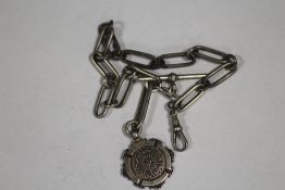 AN ANTIQUE SILVER FANCY LINK POCKET WATCH CHAIN WITH FOB