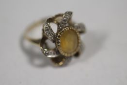 A HALLMARKED 9 CARAT GOLD DRESS RING SET WITH A CITRINE SIZE N APPROX WEIGHT - 4.8G