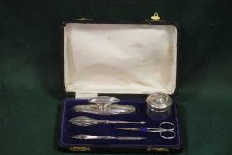 A CASED HALLMARKED SILVER MANICURE SET