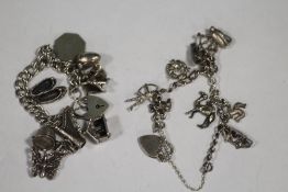 TWO VINTAGE SILVER CHARM BRACELETS