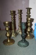 A COLLECTION OF SIX ASSORTED METAL CANDLESTICKS