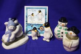 A PAIR OF GOLD STAMPED SNOWMAN PEPPERETTES TOGETHER WITH A BOXED PAIR OF WADE PENGUIN FIGURES AND