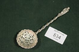A HALLMARKED SILVER SIFTER SPOON