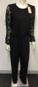 MICHAEL KORS - a ladies black jumpsuit with lace sleeves, size 8