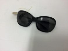 TOM FORD - a pair of black sunglasses