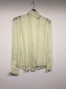 ALEXANDER McQUEEN - a ladies cream blouse, size 14