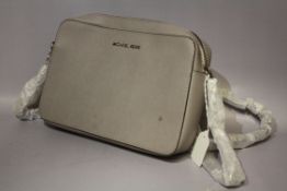 MICHAEL KORS - Grey small shoulder / cross body bag Condition Report:slight marks to front panel