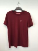 POLO SPORT INTERNATIONAL - a gents red skull logo t shirt, size small