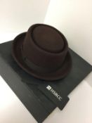 HSBCC - a ladies brown hat, in box