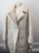 SJYP - a ladies white woollen coat