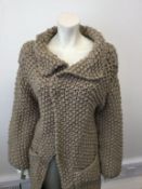 STROM - a ladies beige woollen knitted cardigan with safety pin design, size medium