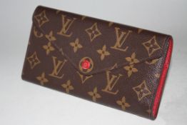 LOUIS VUITTON - a classic Louis Vuitton design purse
