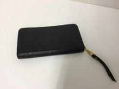 LOUIS VUITTON - a black purse